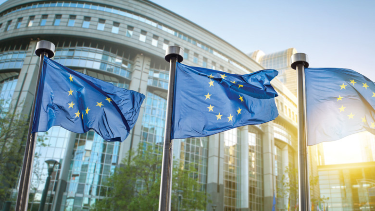 EU flags outside a government building symbolising Europe’s hydrogen policy and funding