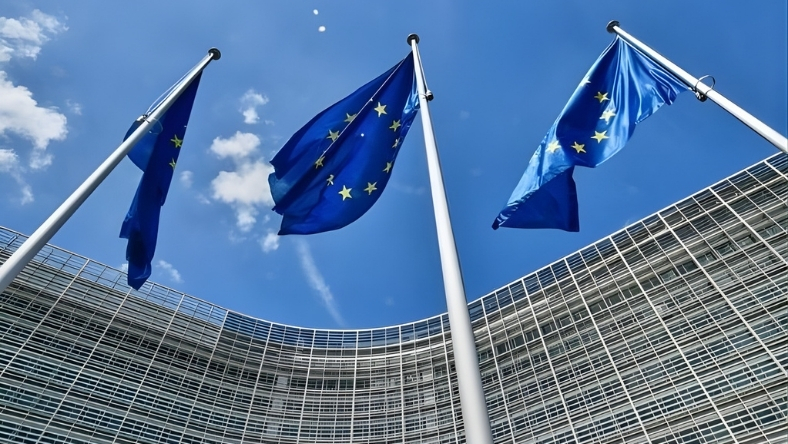 European Union flags flying outside an EU institutional building