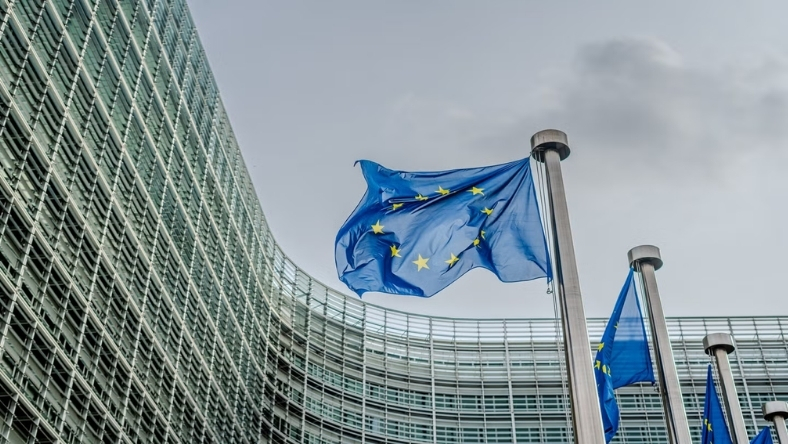 European Union flags flying outside EU government building